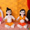 Lalla & Lalli Radha Krishna Idol Showpiece for Home Decor (Orange) Marble - 11 Inch